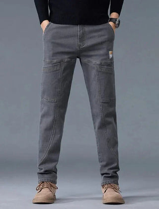 Grey utility jeans with cargo-style pockets and straight relaxed leg shape