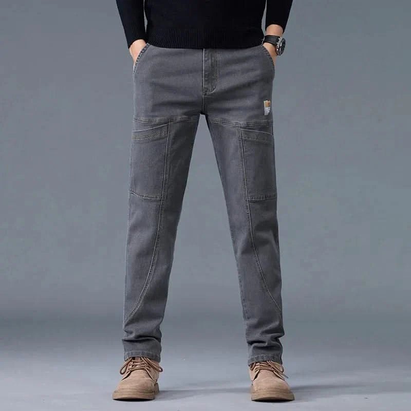 Grey utility jeans with cargo-style pockets and straight relaxed leg shape