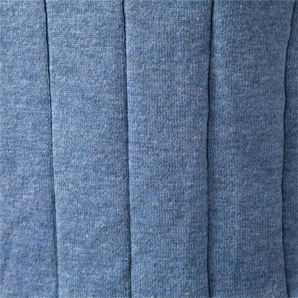 Blue knit fabric close-up with vertical stripe texture and fine heather weave
