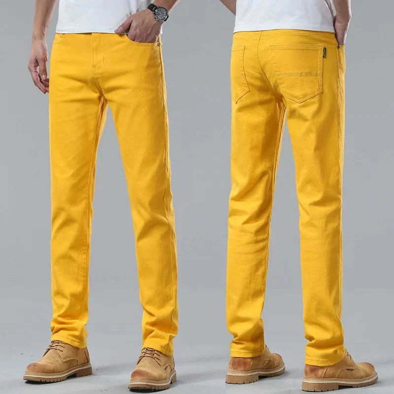 Yellow denim jeans on-model, straight-leg fit with belt loops and front pockets