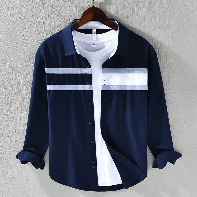 Navy panel button-up shirt with white chest yoke and dark stripe bands, long sleeves