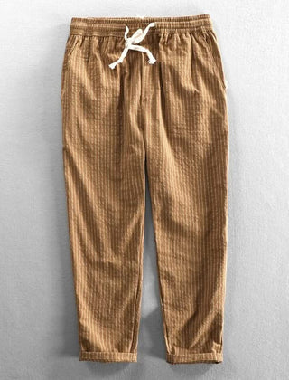 Khaki striped linen pants with elastic waistband and drawstring, cropped ankle length