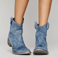 Blue suede orthopedic ankle boots with block heel and pull-on loop detail