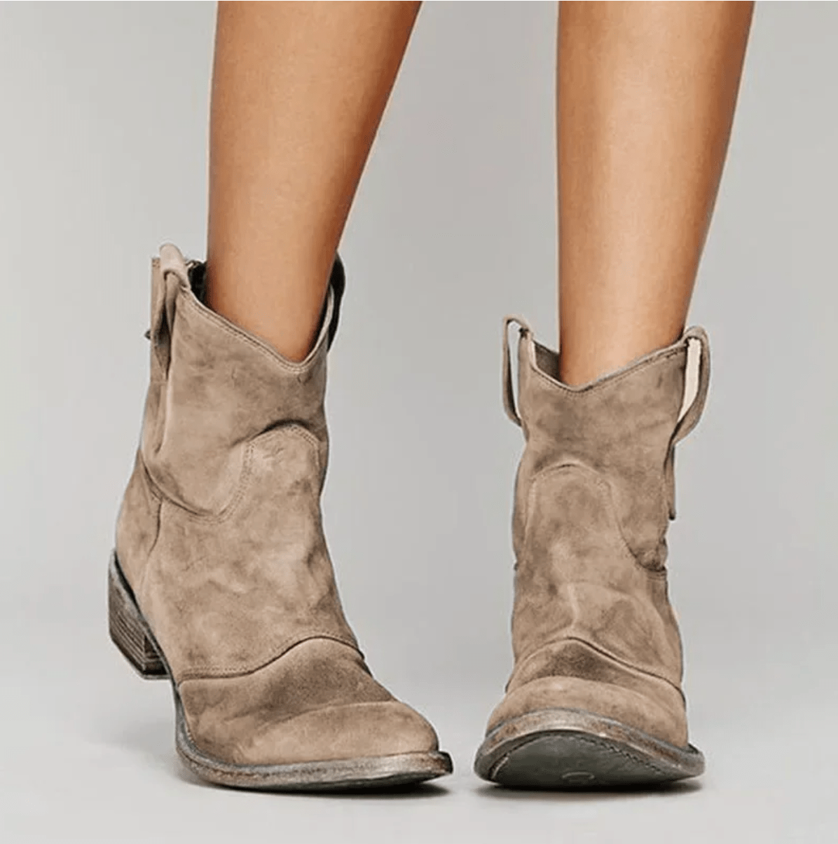 Light brown suede orthopedic ankle boots with block heel and pull-on loop detail