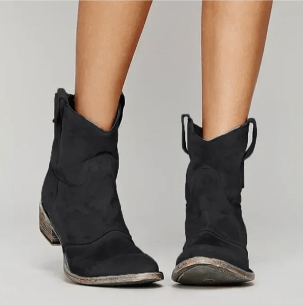Black suede orthopedic ankle boots with block heel and pull-on loop detail