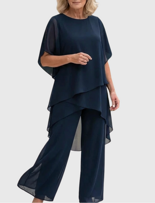 Elara elegant palazzo set in dark navy: draped blouse with cape sleeves and wide-leg pants