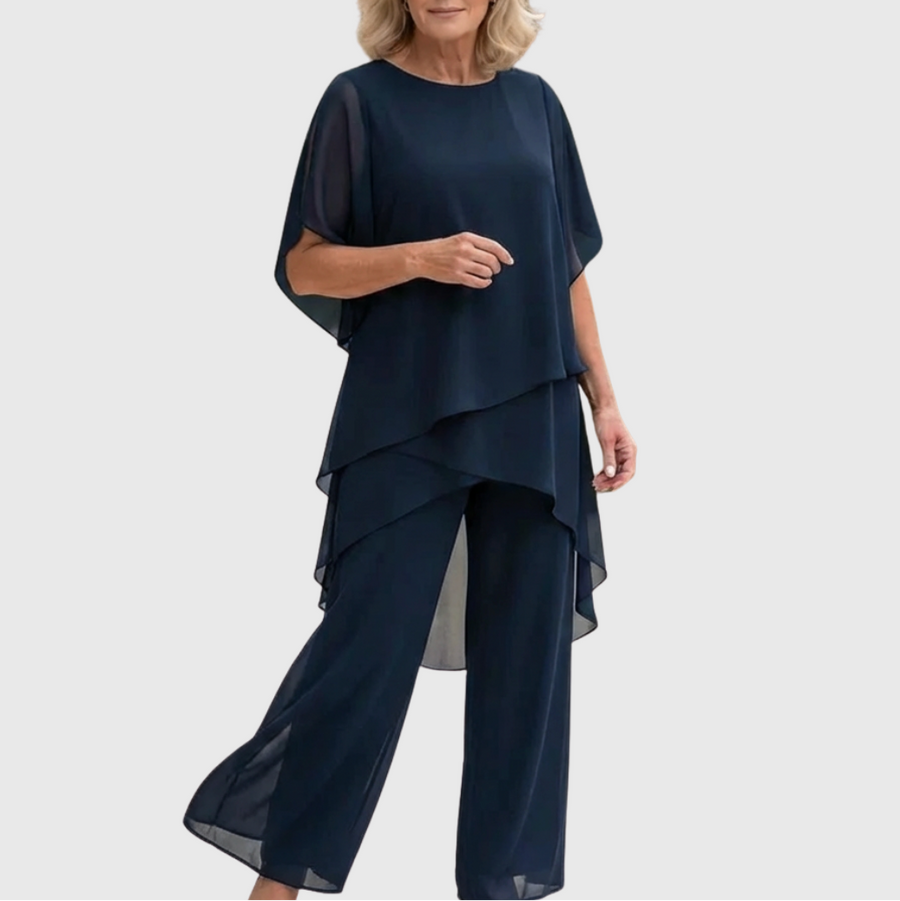 Elara elegant palazzo set in dark navy: draped blouse with cape sleeves and wide-leg pants