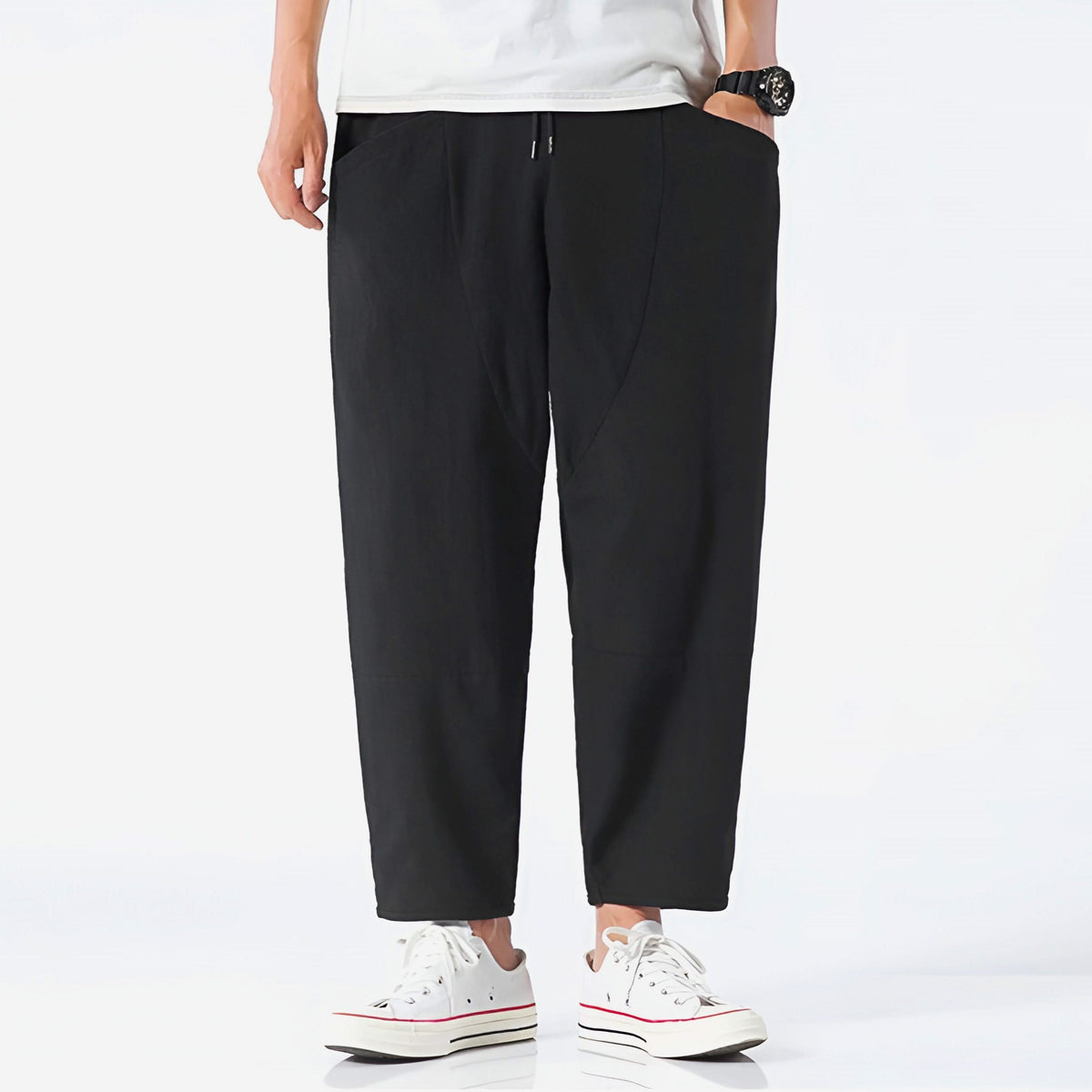 Black cropped cotton pants with drawstring waist and straight tapered legs
