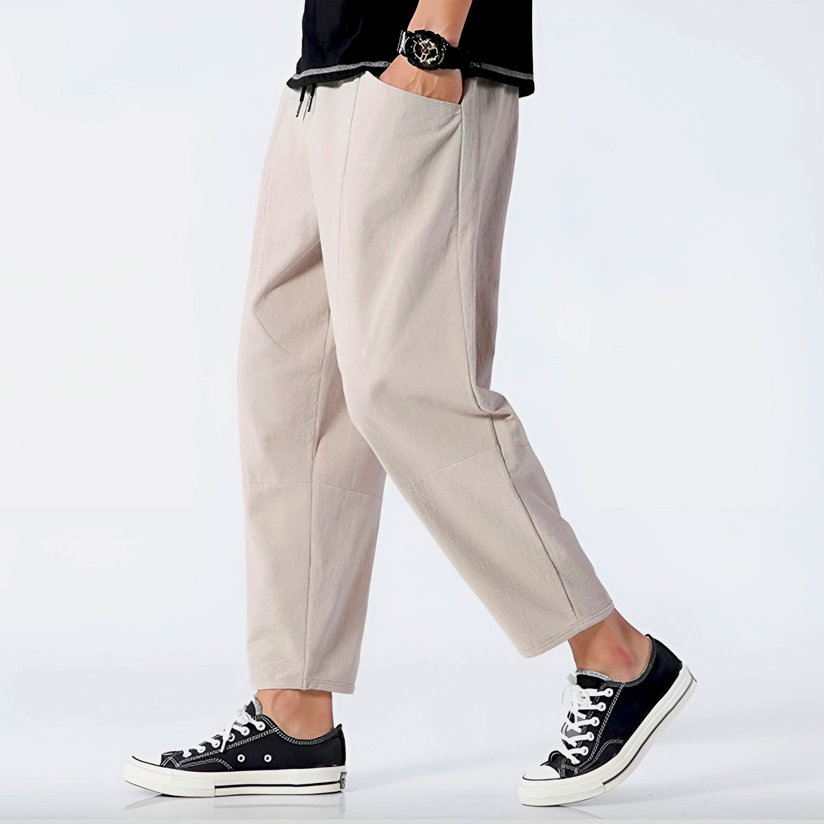 Khaki cropped cotton pants with drawstring waist and tapered straight legs