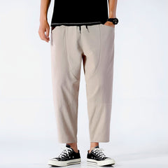 Light khaki cropped cotton pants with drawstring waist and straight cropped fit