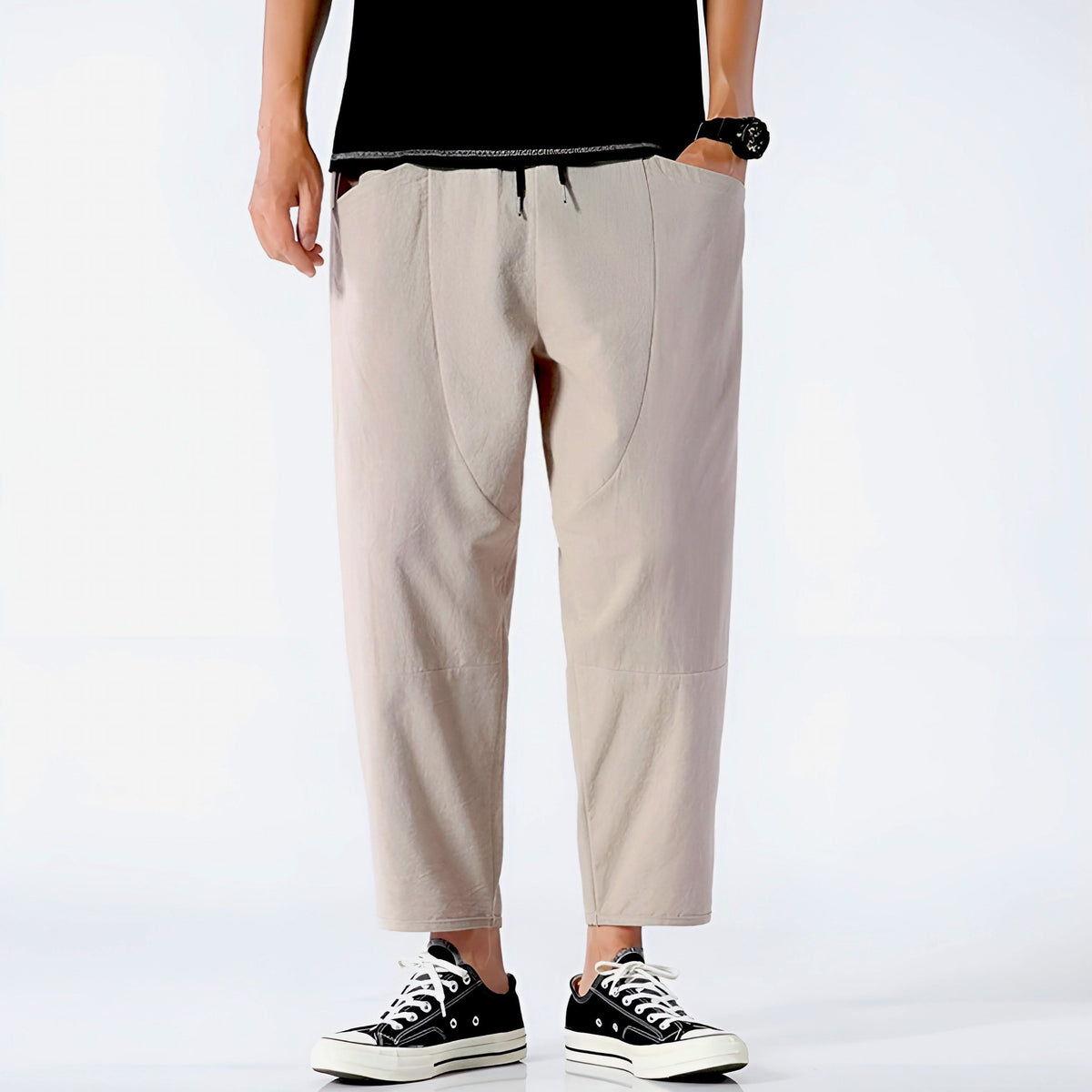 Light khaki cropped cotton pants with drawstring waist and straight cropped fit