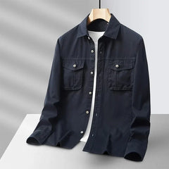 Navy canvas overshirt with button front and two chest pockets