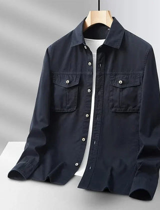 Navy canvas overshirt with button front and two chest pockets