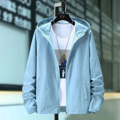 Hooded summer jacket in pale blue, front view with zipper and elastic cuffs