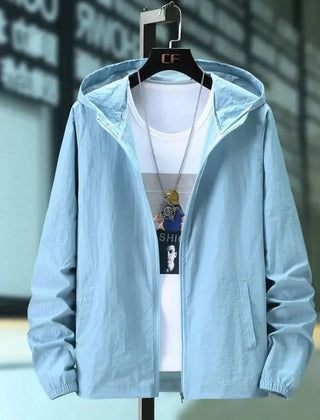 Hooded summer jacket in pale blue, front view with zipper and elastic cuffs