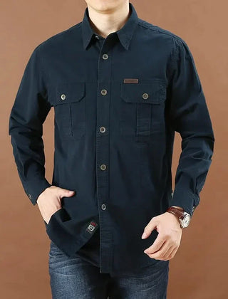 Navy button-up adventure shirt with two chest flap pockets and long sleeves