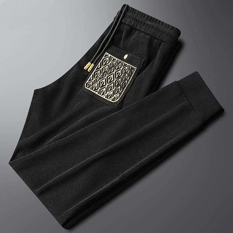 Black ribbed cotton pants, elastic waist with drawstring, front decorative pocket