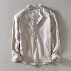 White linen mandarin shirt with stand collar, button placket, and long sleeves
