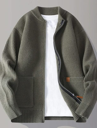 Green rib knit zip-up jacket with stand collar, front pockets, and tan logo patch