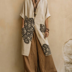 Off-white boho tunic and wide-leg pants set with dark swirl patch panels