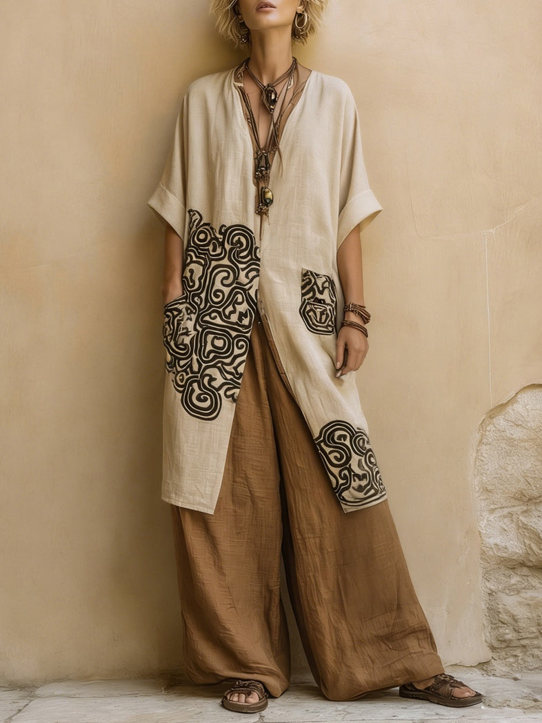 Off-white boho tunic and wide-leg pants set with dark swirl patch panels