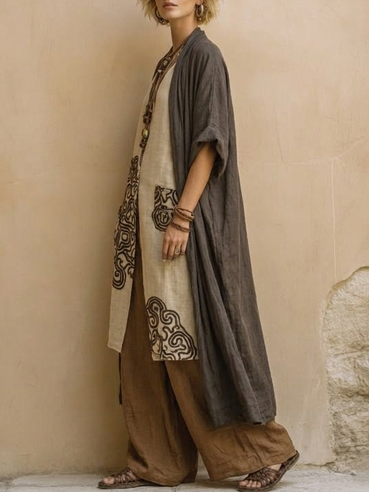 Dark gray boho tunic and wide-leg pants set, side view with swirl pocket panels