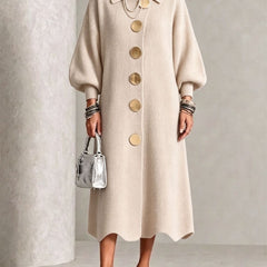 Cream knit button-front midi dress with round neck, wide sleeves, and gold buttons