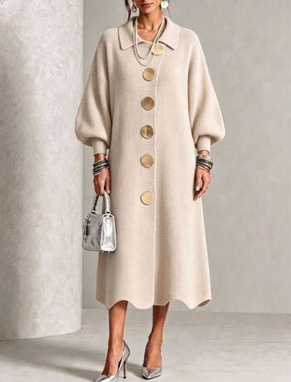 Cream knit button-front midi dress with round neck, wide sleeves, and gold buttons