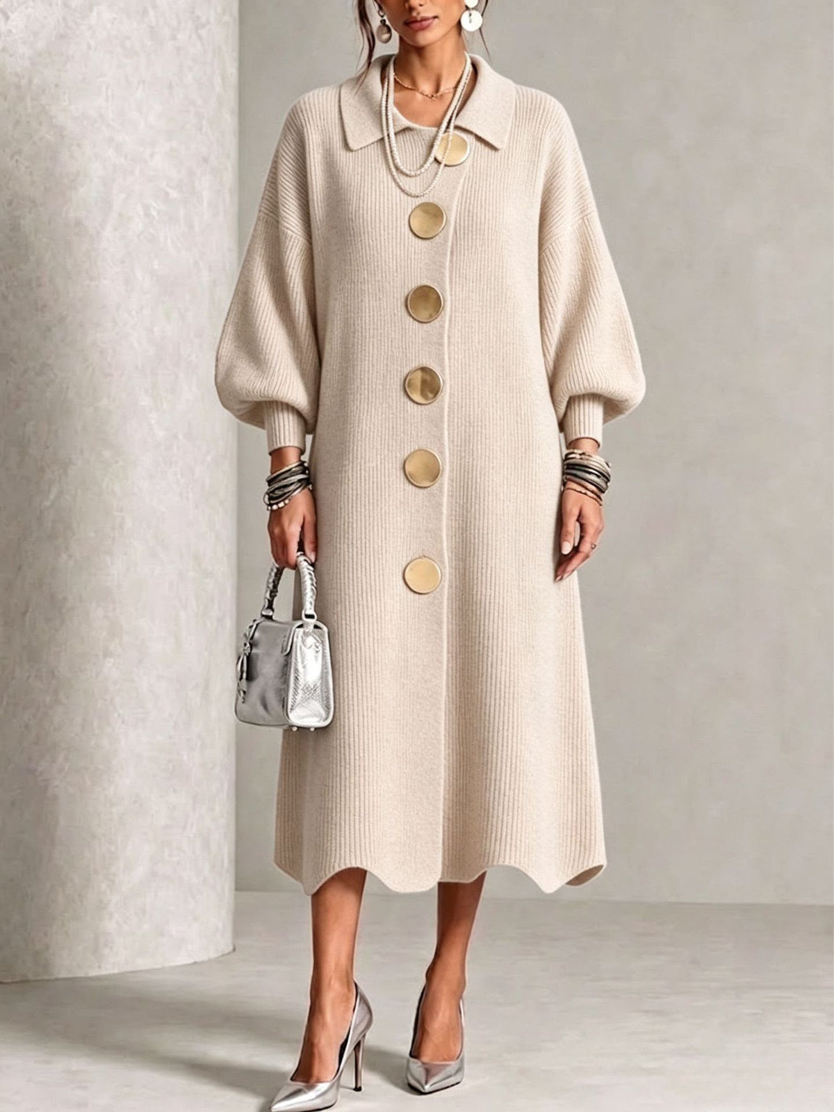 Cream knit button-front midi dress with round neck, wide sleeves, and gold buttons