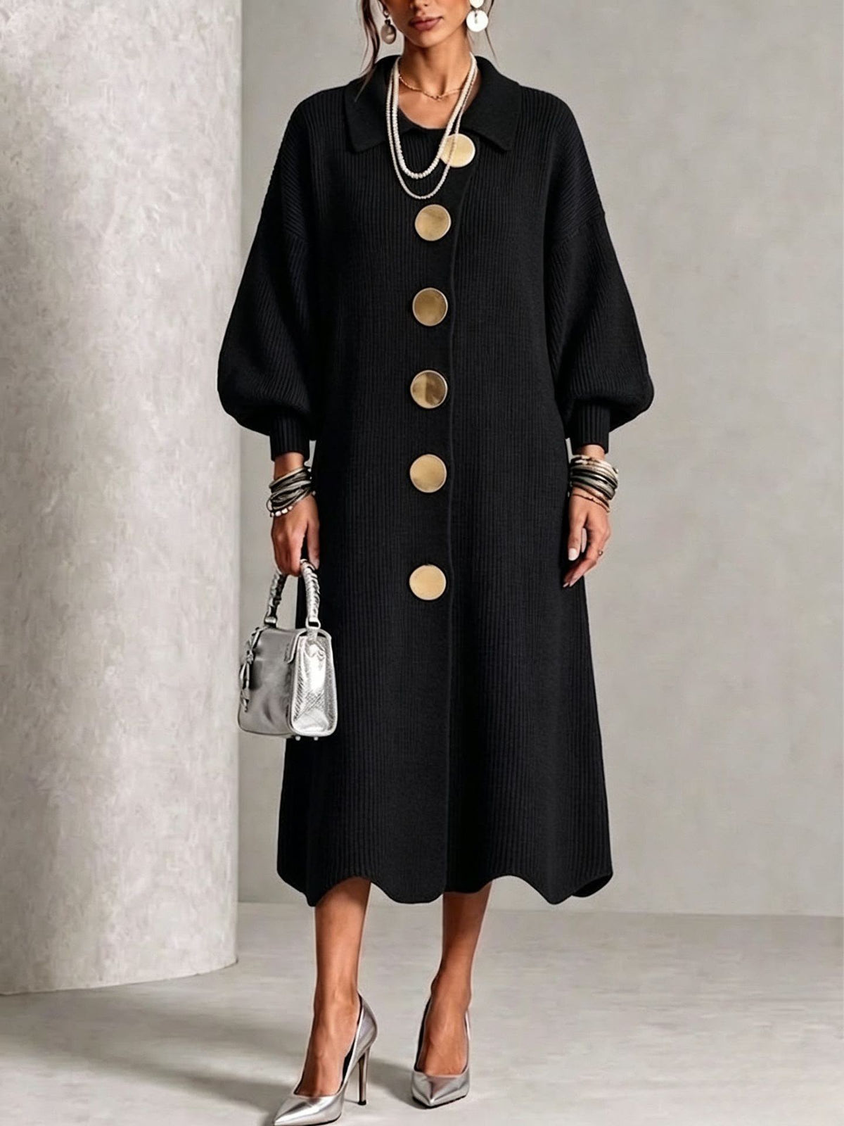 Black knit button-front midi dress with round neck, puff sleeves, and gold buttons