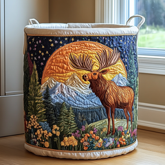 Quilted laundry basket with handles and deer in mountain landscape quilt design