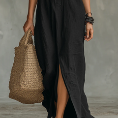 Black maxi dress with side slit and button front, three-quarter sleeves, relaxed fit