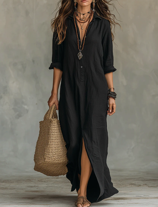 Black button-front maxi dress with V-neck, three-quarter sleeves, and side slit hem