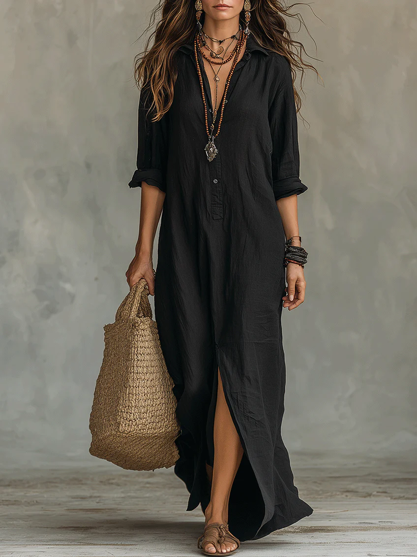 Black button-front maxi dress with V-neck, three-quarter sleeves, and side slit hem