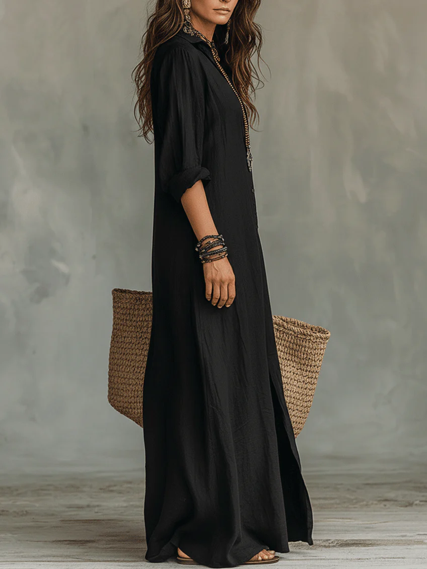 Black button-front maxi dress, three-quarter sleeves, side slit, worn open V-neck