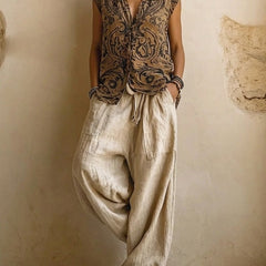 Layered three-piece set: sleeveless patterned vest and linen drawstring pants