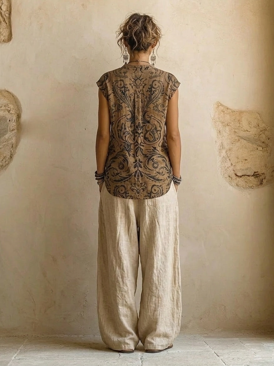 Layered three-piece set: back of patterned sleeveless tunic and linen drawstring pants