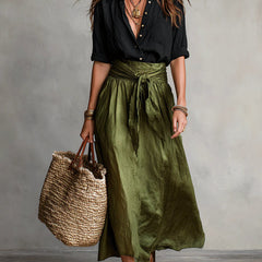 Two-piece set: black blouse with olive green midi skirt