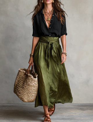 Two-piece set: black blouse with olive green midi skirt