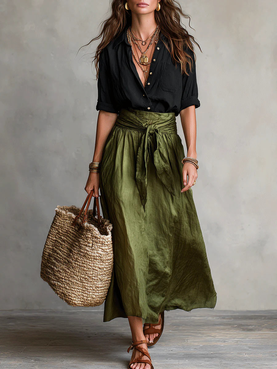 Two-piece set: black blouse with olive green midi skirt