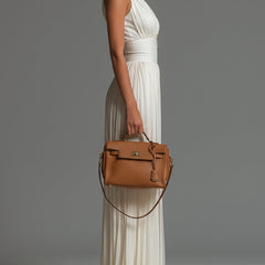 White pleated chiffon halter jumpsuit with fitted waist and wide-leg trousers, side view