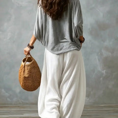 Gray off-shoulder top and white lantern trousers set, back view