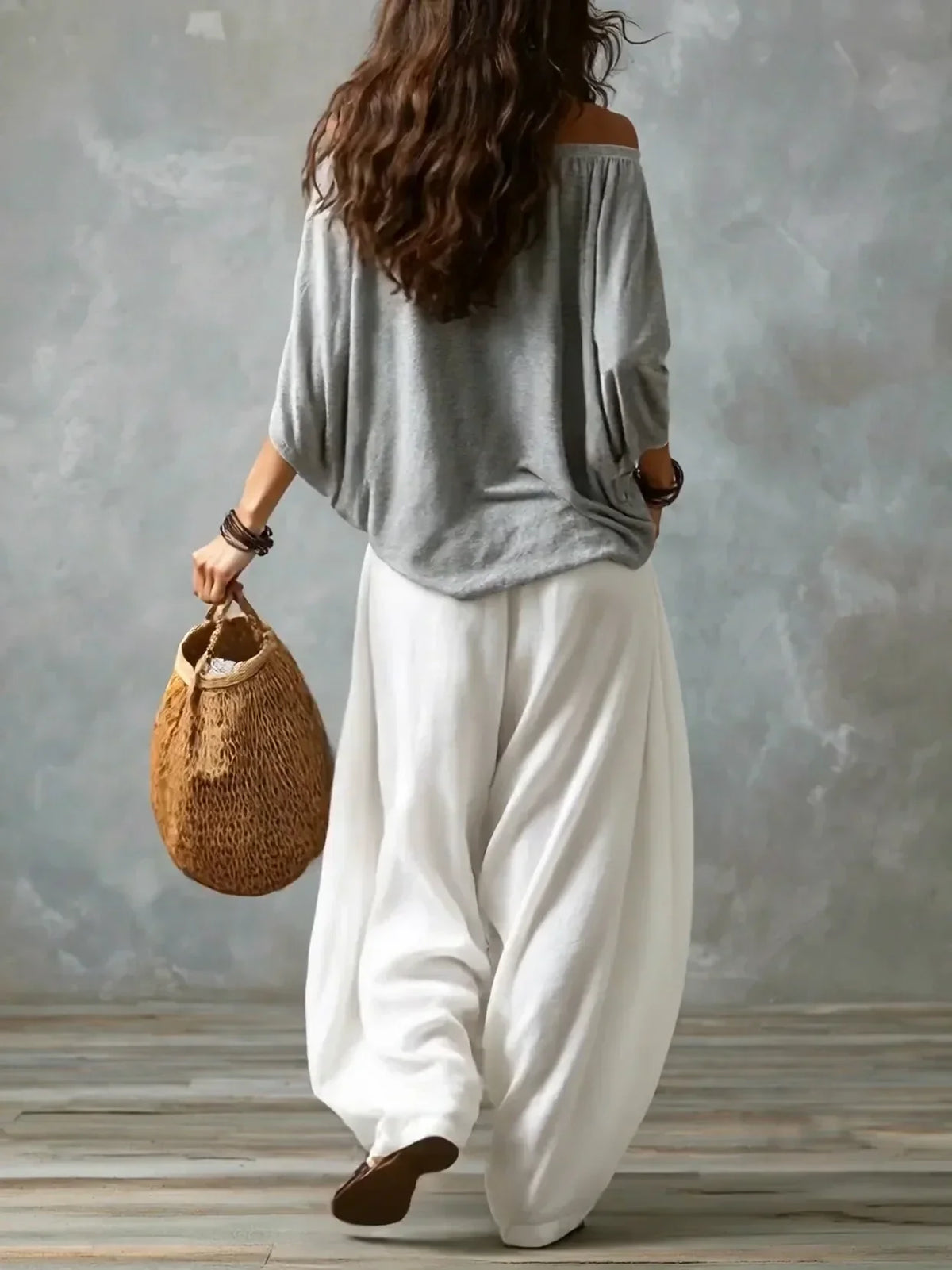 Gray off-shoulder top and white lantern trousers set, back view
