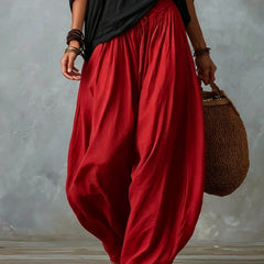 Black off-shoulder top and red lantern trousers set, side view
