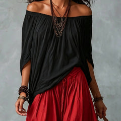 Black off-shoulder peasant top and red lantern trousers set