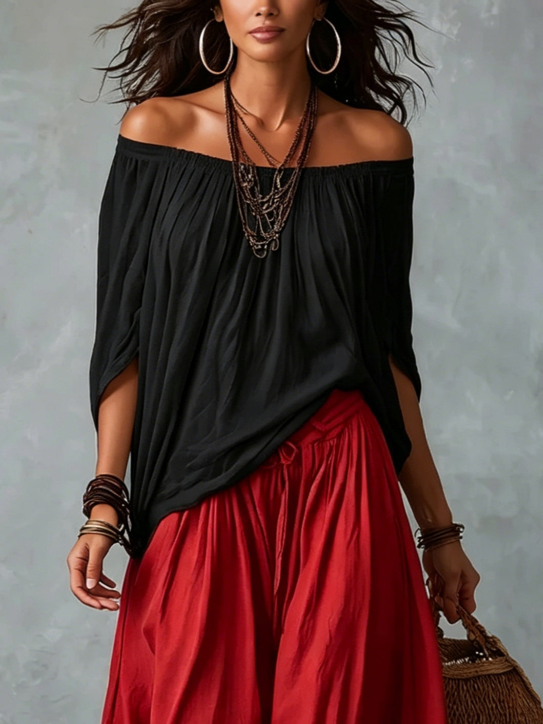 Black off-shoulder peasant top and red lantern trousers set