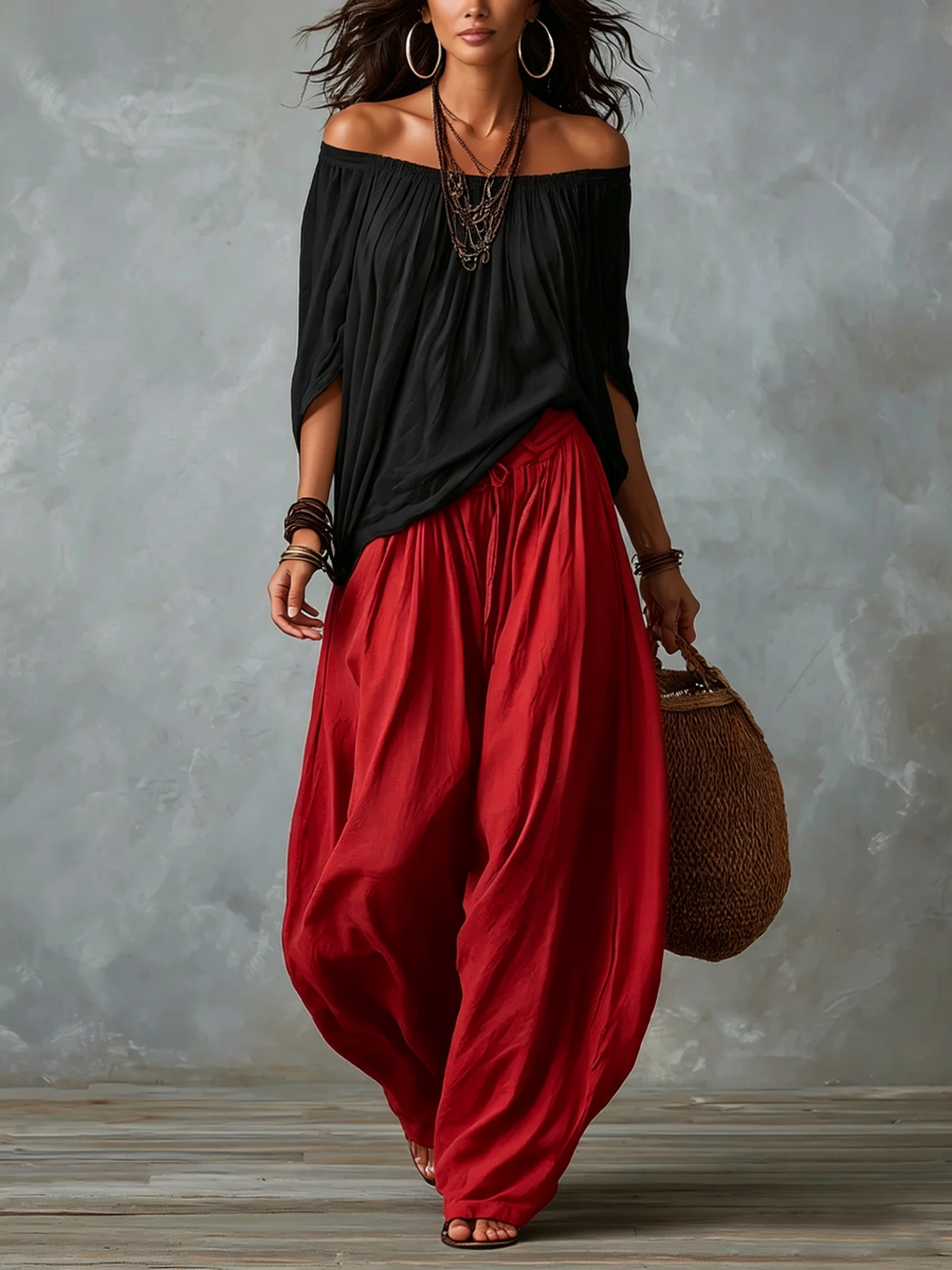 Black off-shoulder top and red lantern trousers set
