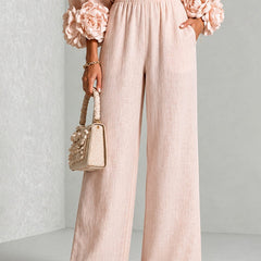 Blush wide-leg pants with matching blouse, elastic waist and floral cuff sleeves