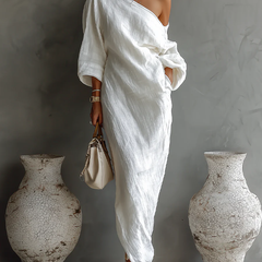White one-shoulder maxi dress with draped wrap bodice and gathered waist