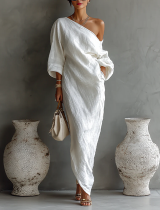 White one-shoulder maxi dress with draped wrap bodice and gathered waist